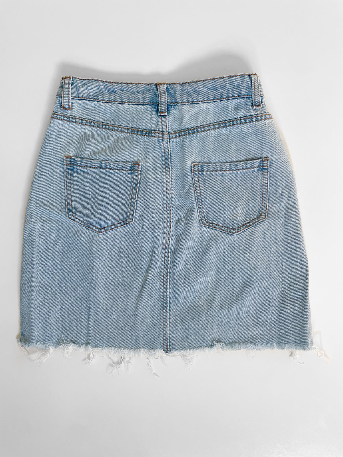 Distressed High Waisted Light Wash Denim Mini Skirt