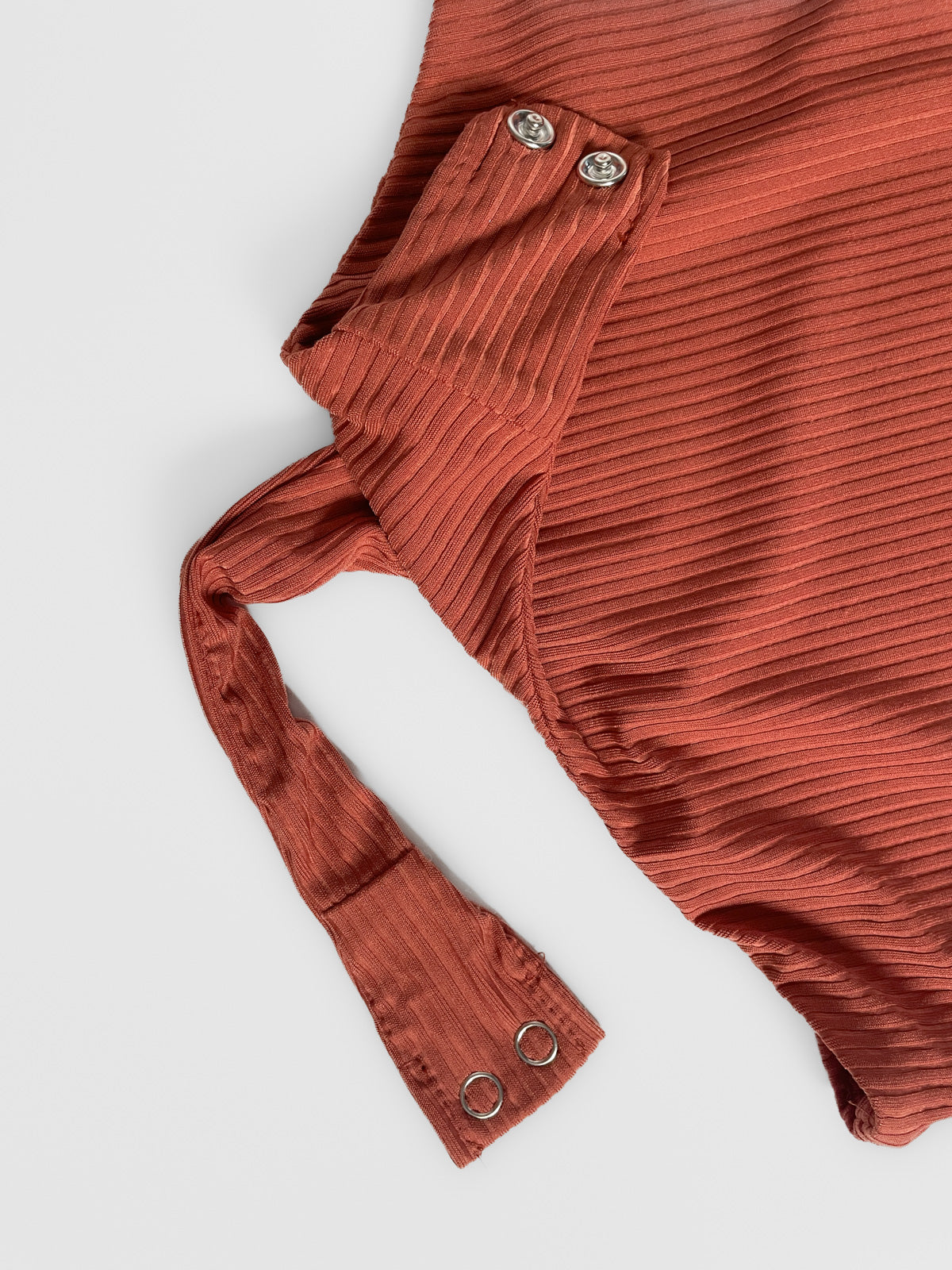 One Sleeve Ribbed Bodysuit in Burnt Ochre