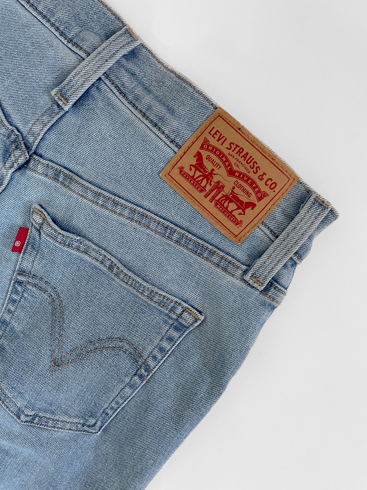 Distressed High Waist Stretch Mom Jeans in Light Wash Blue