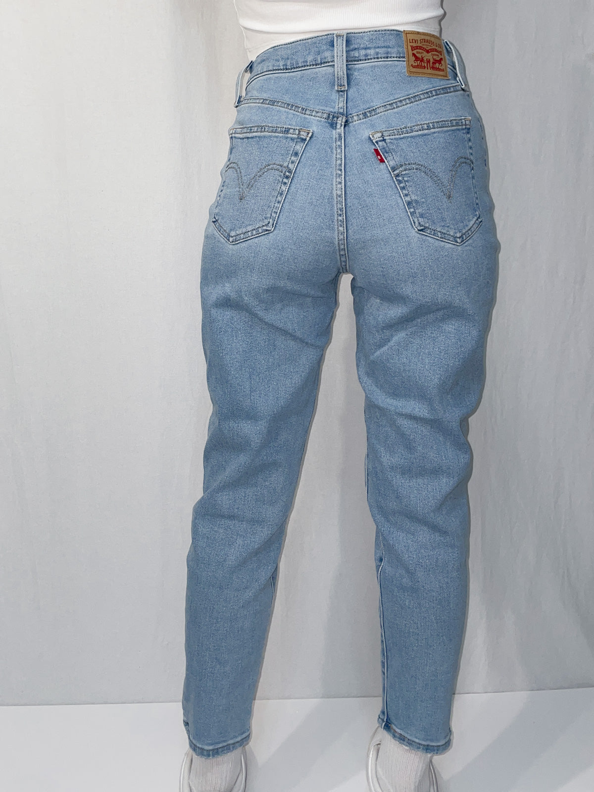 Distressed High Waist Stretch Mom Jeans in Light Wash Blue