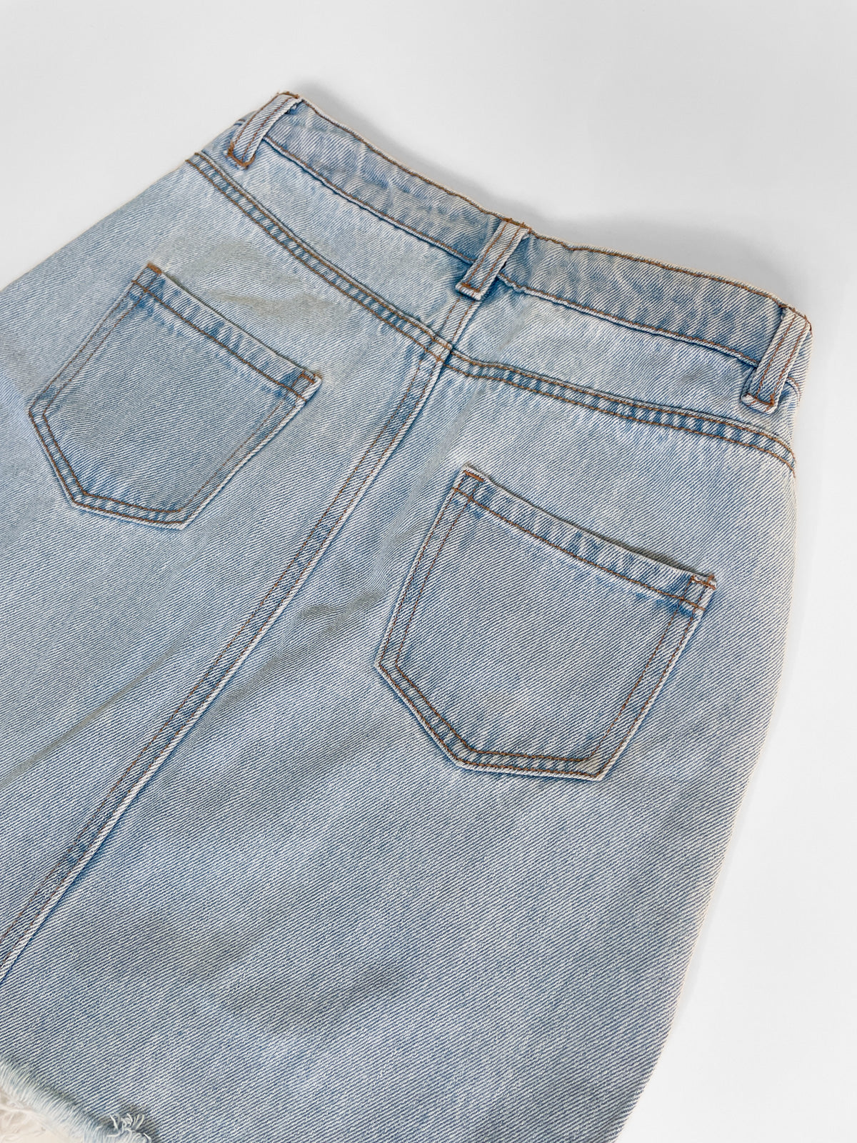 Distressed High Waisted Light Wash Denim Mini Skirt